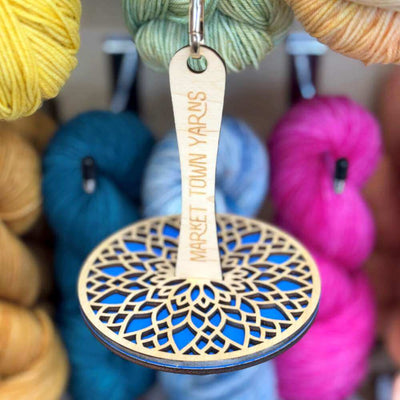 Market Town Yarns - Wooden Wrist Yarn Holder shown in blue | Yarn Worx