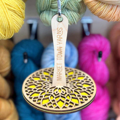 Market Town Yarns - Wooden Wrist Yarn Holder shown in yellow | Yarn Worx